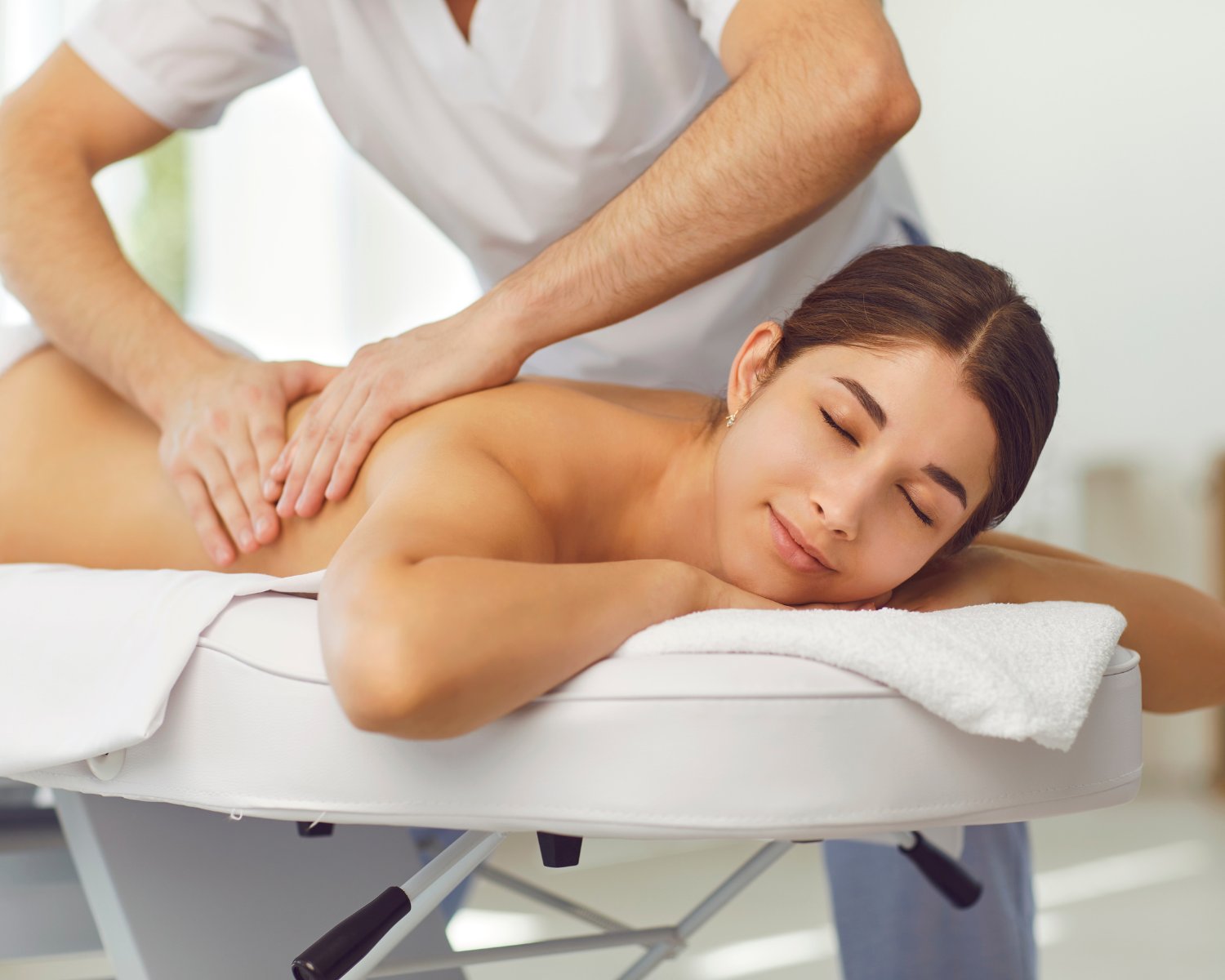 Patient receiving gentle soft tissue osteopathic treatment at Fix Mi Osteo Brampton